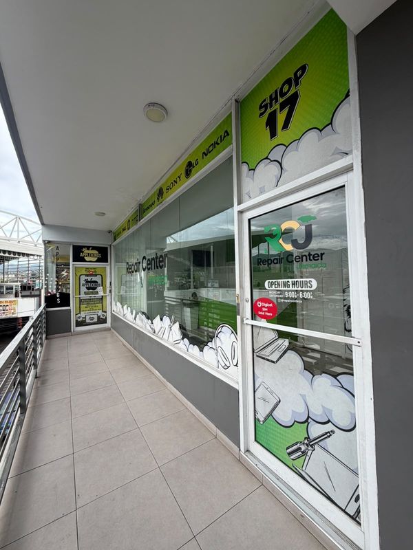 The Repair Center Jamaica shop front, Shop 17