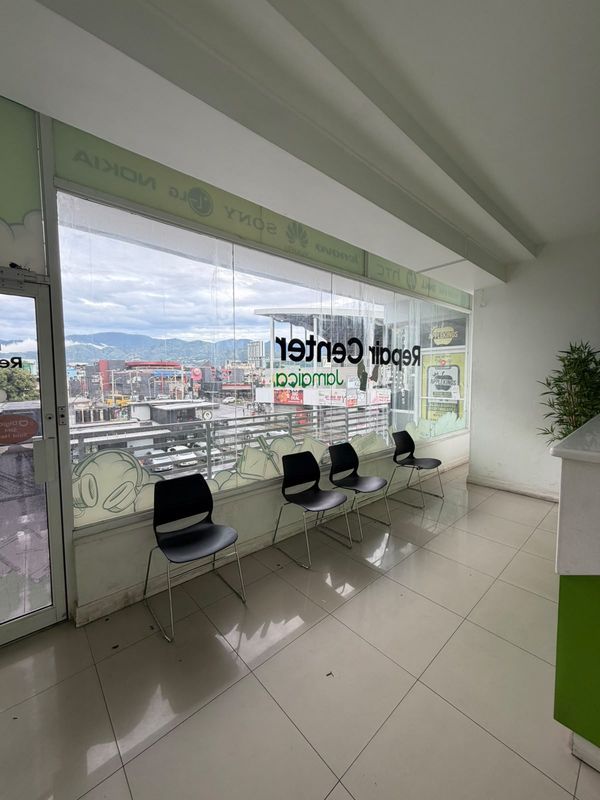 The waiting area, with seats by the window
